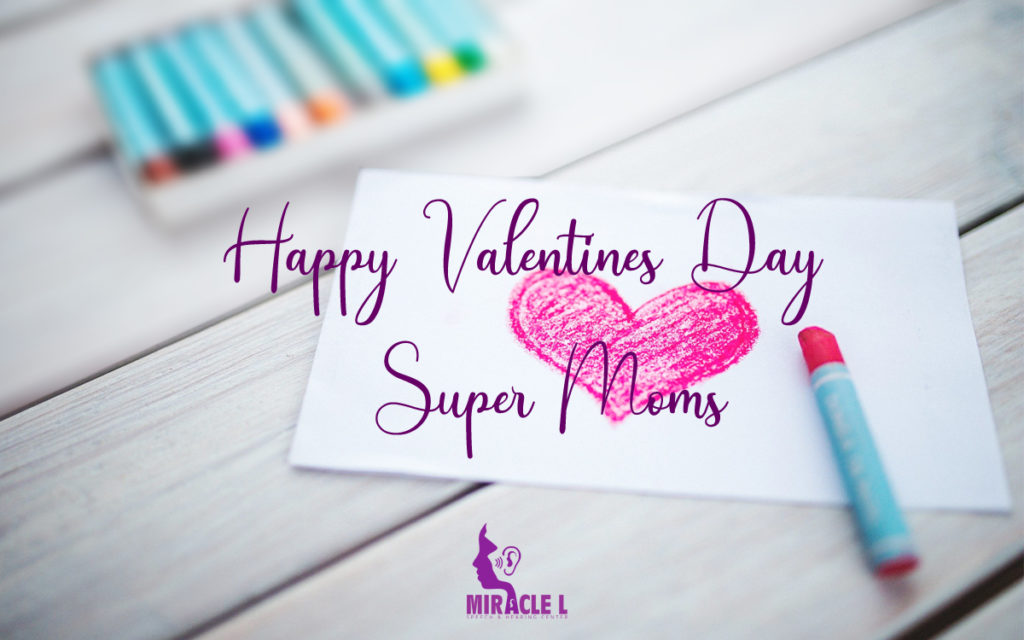 child with autism draw a heart to wish her mother happy valentines day