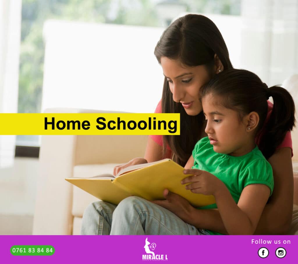 mother home schooling her daughter who is speech delayed